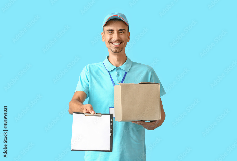 Male courier with parcel and clipboard on color background Male courier with parcel and clipboard on color background