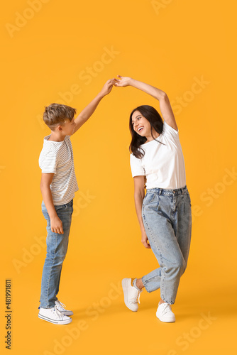 Happy dancing woman and her...