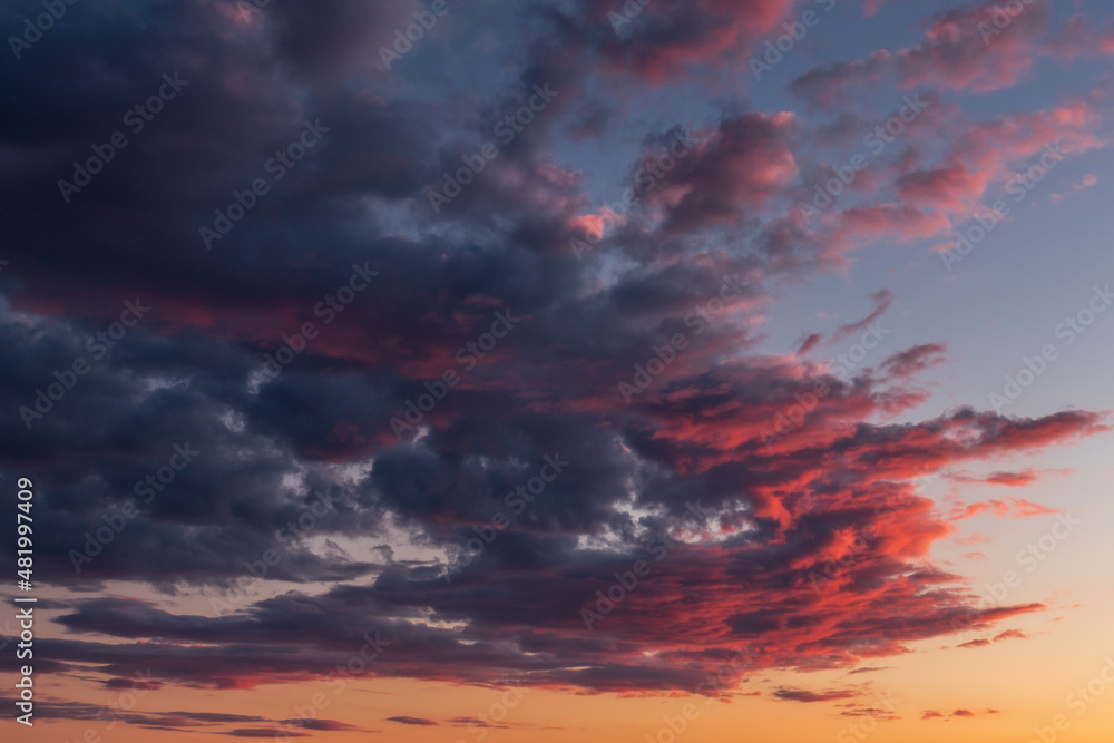 Colorful cloudscape in the light of the rising sun