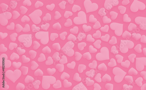 Pink hearts on pink paper. Valentine's Day backround.