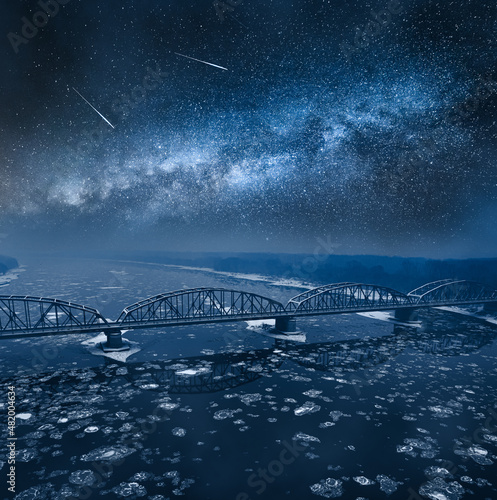 Milky way over floes on riv...