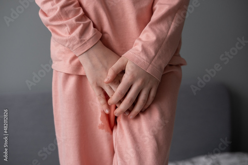 Obraz na płótnie Child described pants. inflammation of the urinary system in a child, cystitis, urinary incontinence w salonie