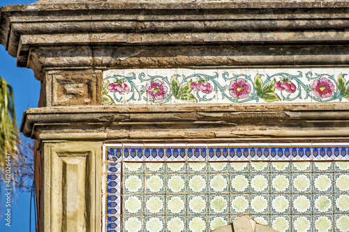 Azulejos panels on facade of a house in the old town of Faro, Algarve, Portugal 