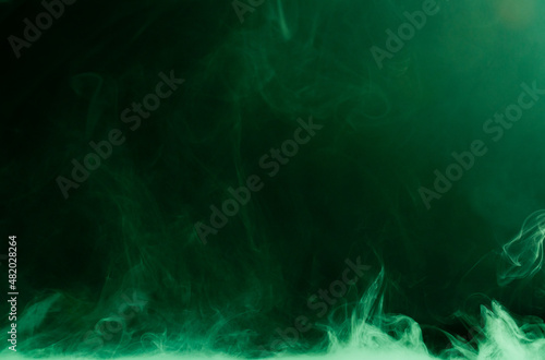 Green steam on a black background