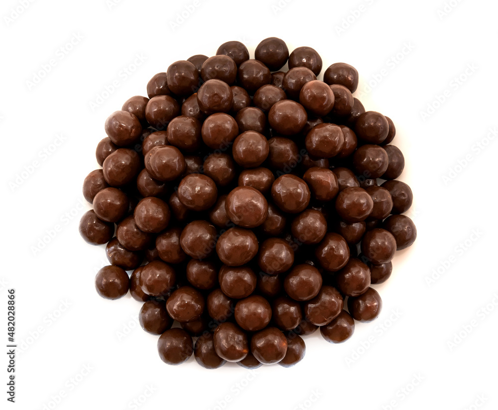 Chocolate milk balls. Background of a large number of brown chocolate balls Chocolate milk balls. Background of a large number of brown chocolate balls