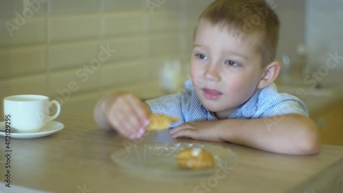 little child eating breakfast
