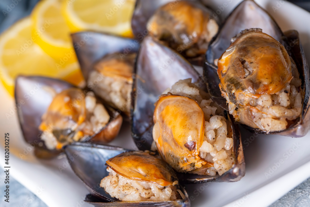 Turkish Street Food Stuffed Mussels with Lemon - Midye Dolma Turkish Street Food Stuffed Mussels with Lemon - Midye Dolma