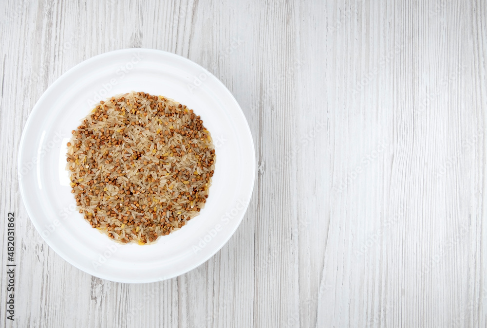 cereals on the table, free space. buckwheat, rice, bulgur in a bowl. porridge mix cereals on the table, free space. buckwheat, rice, bulgur in a bowl. porridge mix