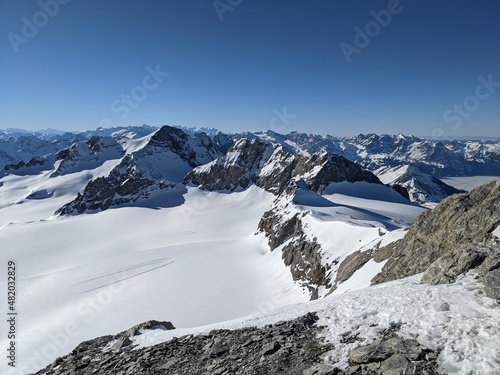 Mount Clariden. Beautiful view of the mountains of uri glarus and grisons. Mountaineering in winter with skis photo