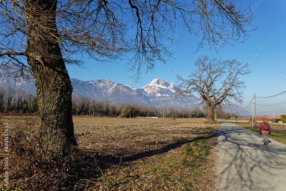 Walk on a small road with beautiful mountain landscape Walk on a small road with beautiful mountain landscape
