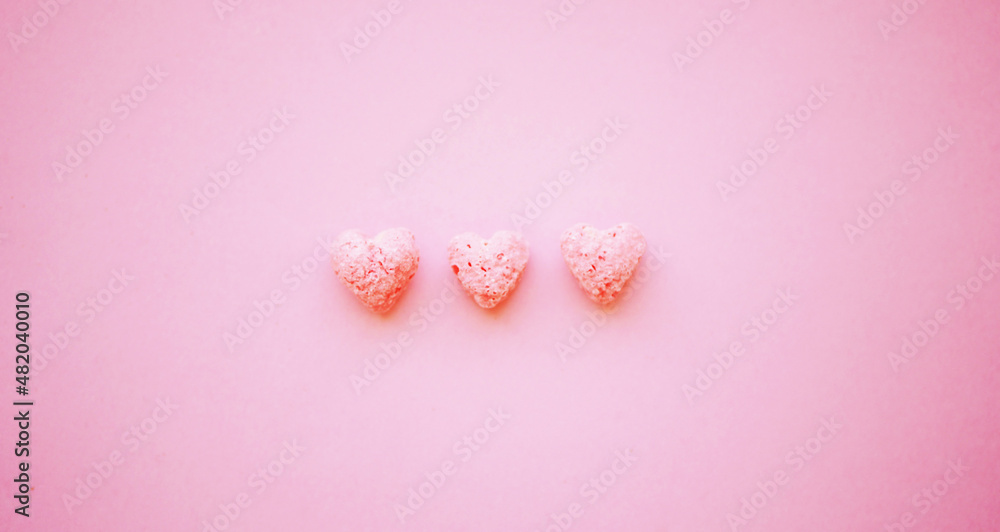 Heart-shaped cereals flat lay. Minimalistic Valentines day greeting card