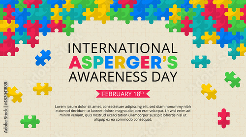 Asperger day background with arranged puzzles at a puzzle table