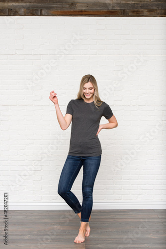 Graphic T-shirt Bella Canvas 3001 CVC Blank Mockup Tee Smiling Woman Model  Dark Grey Heather