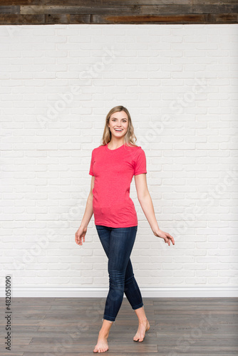 Fuchsia Graphic T-shirt Bella Canvas 3001 Blank Mockup Tee Female Blonde Smiling Woman Model  © Boxels