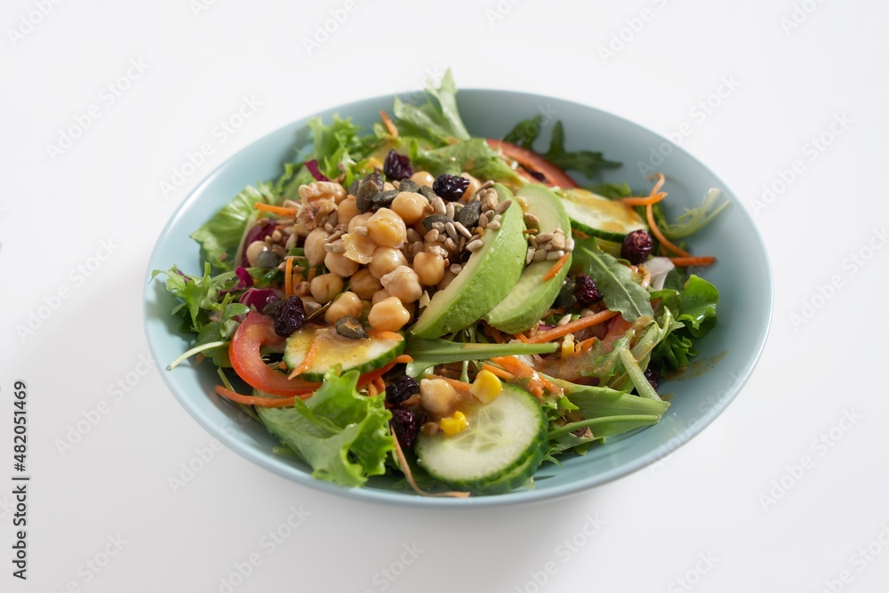 Avocado salad, chickpeas, cucumber, tomato, lettuce, seeds Avocado salad, chickpeas, cucumber, tomato, lettuce, seeds