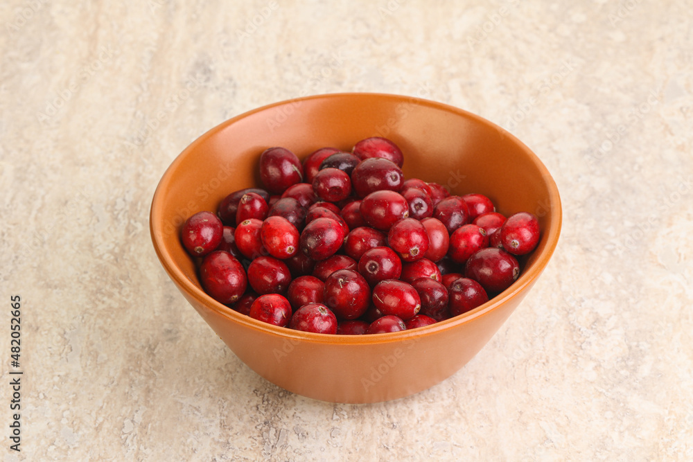 Ripe sweet tasty cranberry in the bowl Ripe sweet tasty cranberry in the bowl