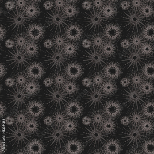 Seamless geometric pattern of mandalas, flowers. A white ornament on a black background, hand-drawn. Retro style. Design of the background, interior, wallpaper, textiles, fabric, packaging. © t.karnash