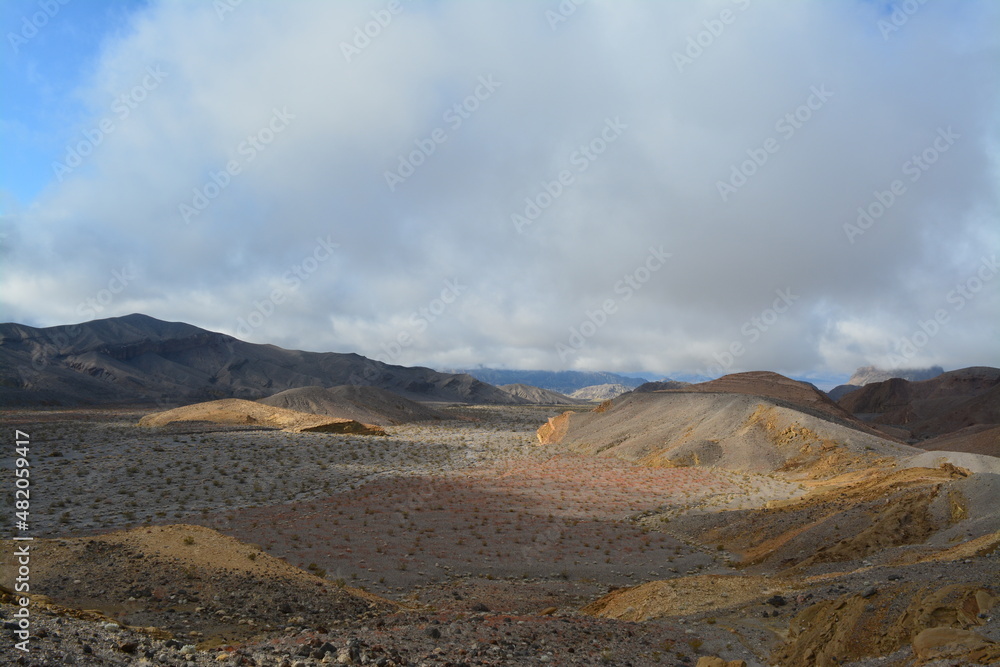 blue sky and clouds on a sunny day in December in Death Valley National Park