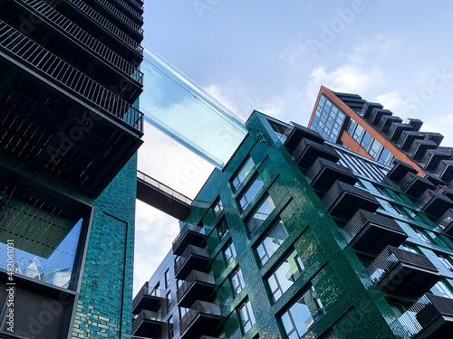 Foto Facade of modern residential building with aerial swimming pool in Nine Elm area near American embassy in London