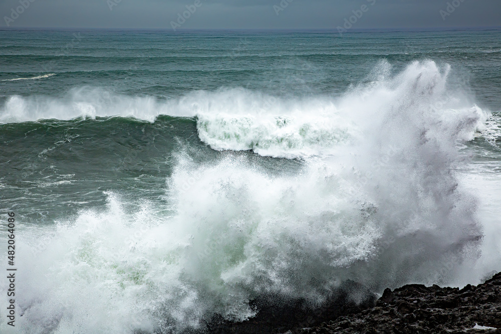 Huge waves on the Oregon coast near Depoe Bay during a winter storm Huge waves on the Oregon coast near Depoe Bay during a winter storm