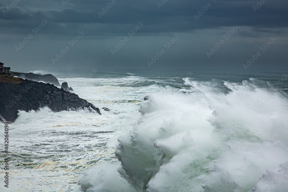 Huge waves on the Oregon coast near Depoe Bay during a winter storm Huge waves on the Oregon coast near Depoe Bay during a winter storm