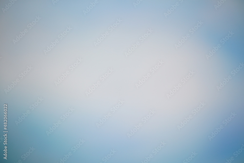 Farbenfrohes Bokeh mit weichen Verläufen von Farben, Nuancen von Licht und Schatten als Hintergrund Textur mit blau Farbenfrohes Bokeh mit weichen Verläufen von Farben, Nuancen von Licht und Schatten als Hintergrund Textur mit blau