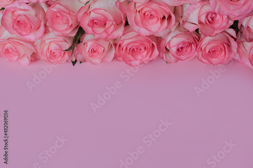 beautiful bouquet of pink roses on pink background. Mother s day  Valentines Day  8 march. weading  Birthday celebration concept. Greeting card. Copy space  top view