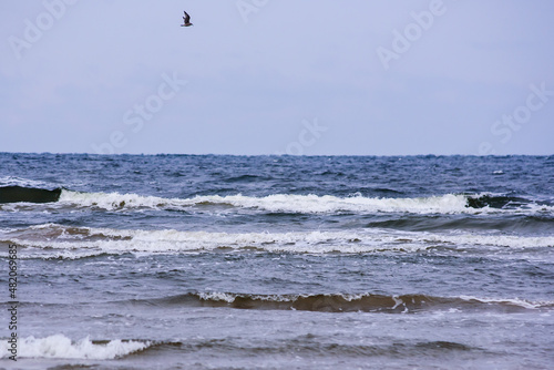 Selective focus photo. Waves in the sea.
