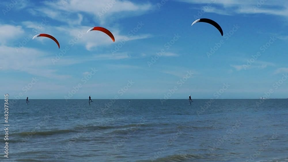 Kite boarders sail across the Gulf of Mexico on a windy day at St. Pete Beach, Florida. Kite boarders sail across the Gulf of Mexico on a windy day at St. Pete Beach, Florida.