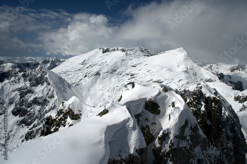 Julian Alps at the winter in Triglav National Park, Slovenia. This picture was taken top of the Mount Visevnik. photo