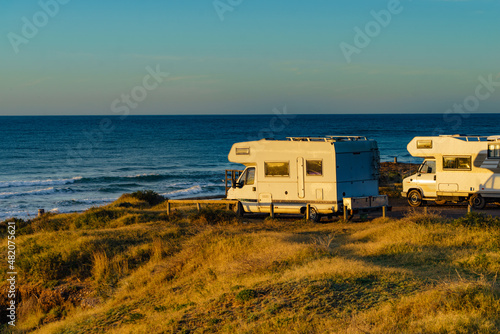 Camper rv camping on sea shore, Spain © anetlanda