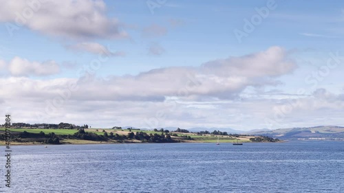The Black Isle.  A time-lapse recording of the view from Invergordon across Cromarty Firth to the Black Isle.  The Black Isle is a peninsula within Ross and Cromarty in the Scottish Highlands. photo