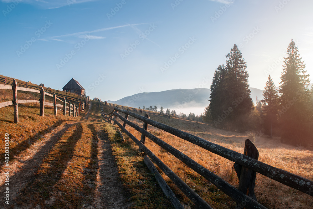 Typical wooden fence for sheep grazing in Carpathian mountains.