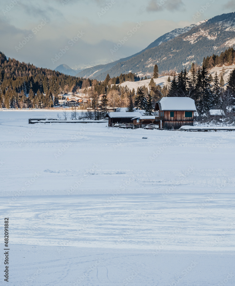 winter in the Austria mountains and frozen alpine White lake
