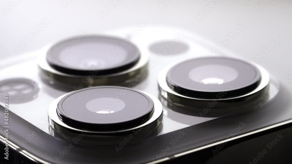 Macro advertising footage, exterior design. Apple new smartphone with triple-lens camera - Ultra Wide, Wide and Telephoto