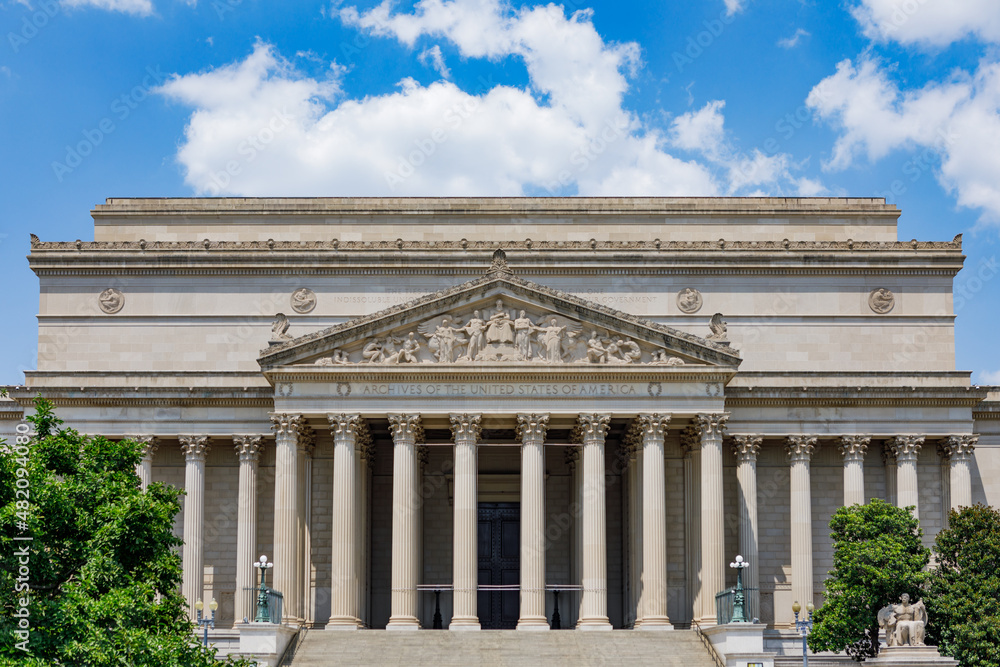 Exterior of the National Archives building located on the National Mall in Washington, DC. It is a museum where the US Constitution, Bill of Rights and Declaration of Independence are displayed.