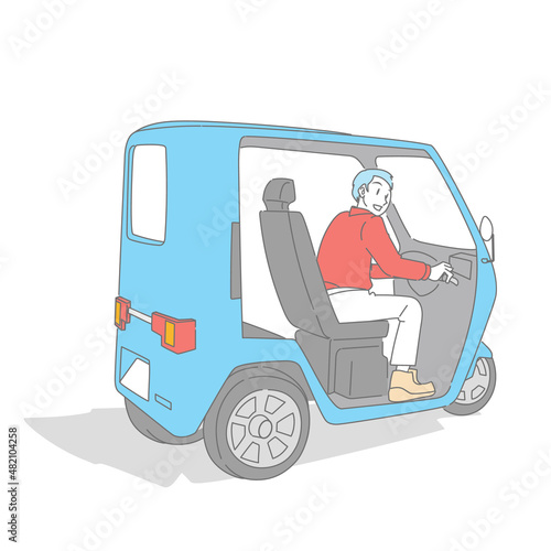 電動トゥクトゥクを運転する男性