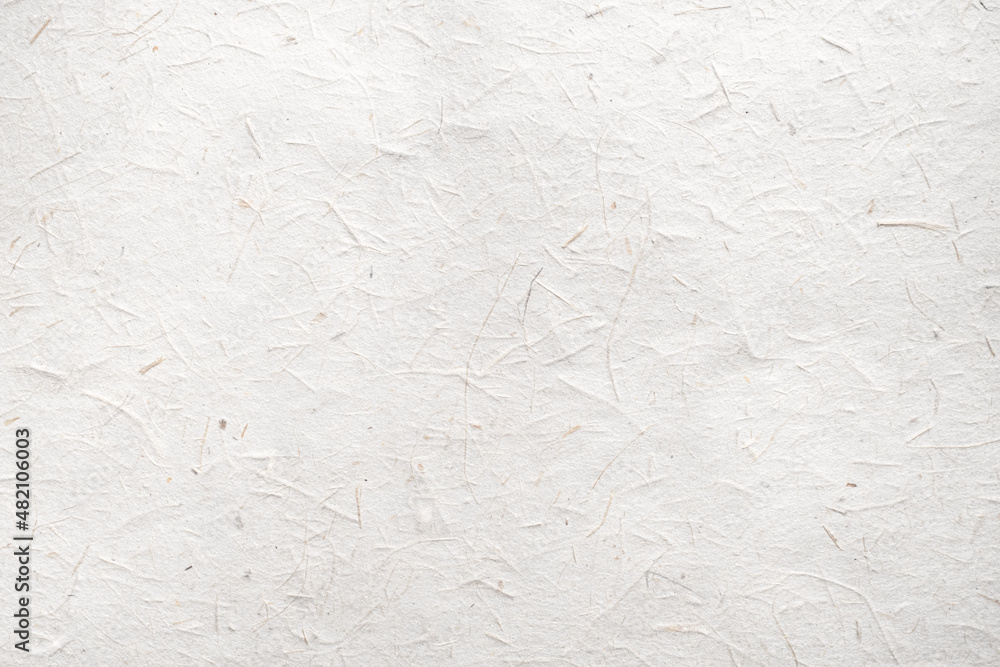 White craft paper texture background from made natural leaves. Recycled paper texture background banner concept. White craft paper texture background from made natural leaves. Recycled paper texture background banner concept.