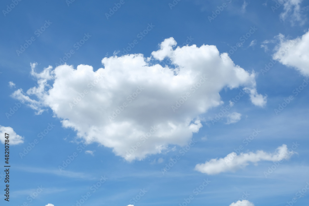 Naklejka premium Southeast Asian weathers and clouds. Cumulus Clouds and Blue Sky. Distinct pile of large formation with rounded edge, cumulus clouds are sign of fair weather