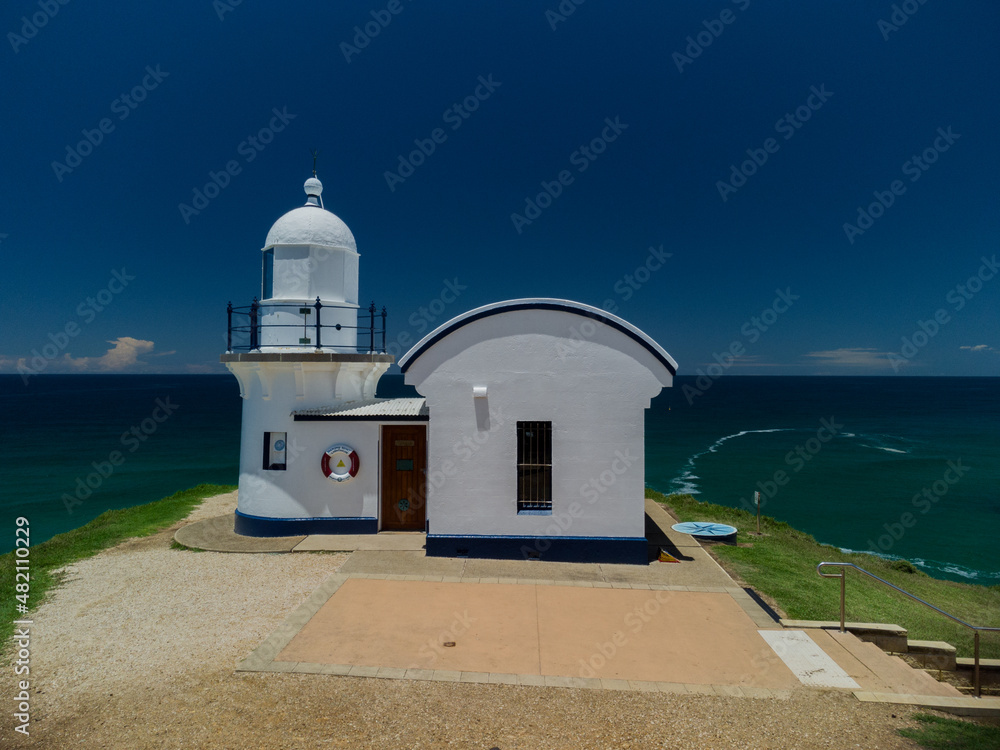lighthouse on ocean headland