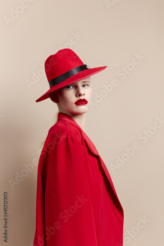 portrait of a woman in a red hat and jacket makeup Lifestyle posing