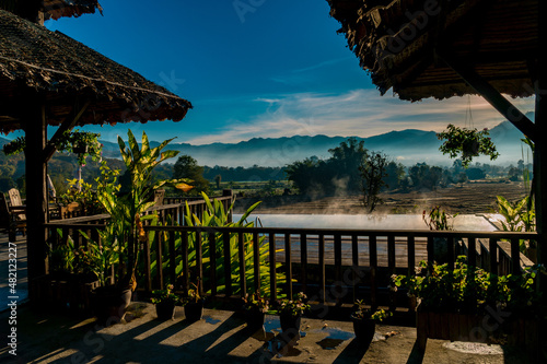 Private resort pool with mist over water in the morning