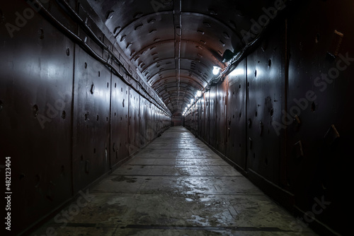 old bomb shelter tunnel in an underground bunker. Protection from bombardment. photo