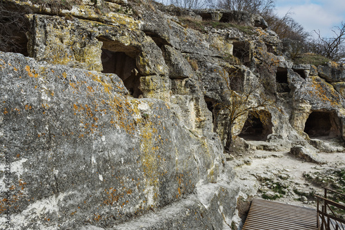 Caves in the rock Cave city Chufut-Kale in Bakhchysarai, Crimea photo