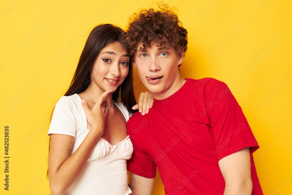 Fototapeta premium young boy and girl hug together antics Lifestyle unaltered