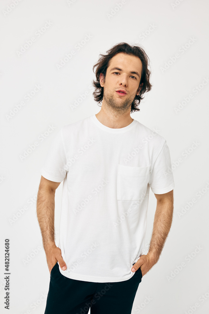 Attractive man casual wear posing emotions isolated background Attractive man casual wear posing emotions isolated background