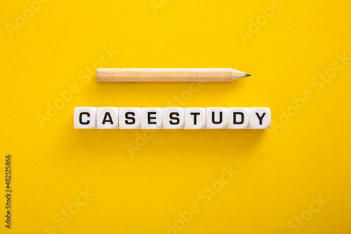 Case Study word with pencil on yellow background