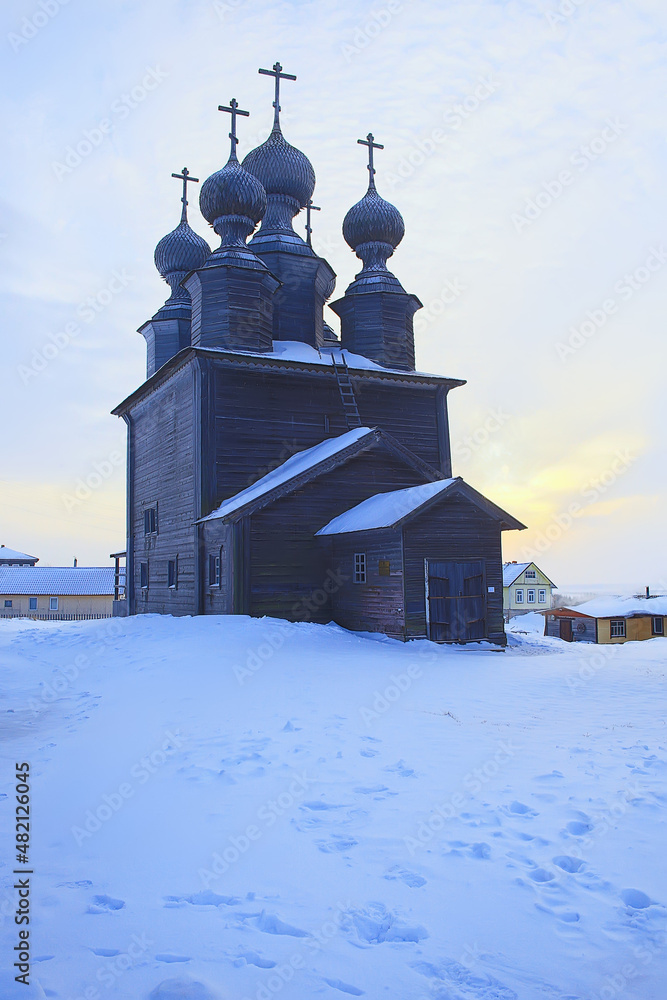 wooden church in the Russian north landscape in winter, architecture historical religion Christianity