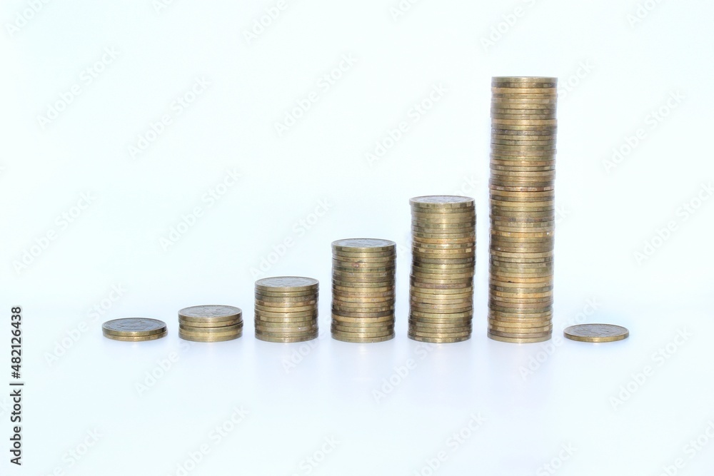 Financial investment trading. Bankruptcy. Short transactions. Economic crisis. Coins on white background Financial investment trading. Bankruptcy. Short transactions. Economic crisis. Coins on white background