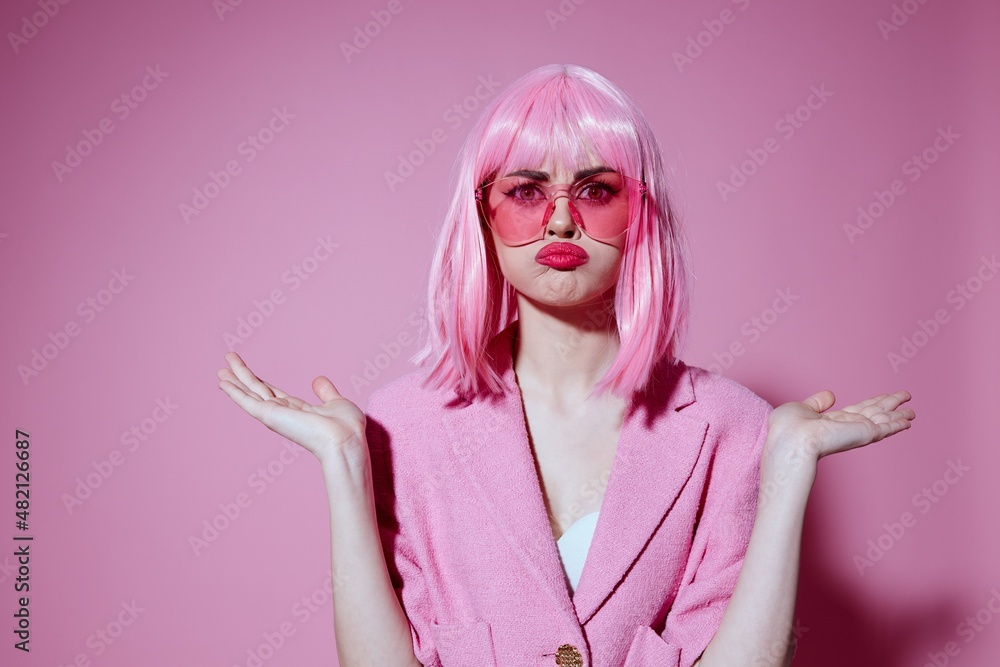 Beauty Fashion woman bright makeup pink hair glamor stylish glasses monochrome shot unaltered Beauty Fashion woman bright makeup pink hair glamor stylish glasses monochrome shot unaltered